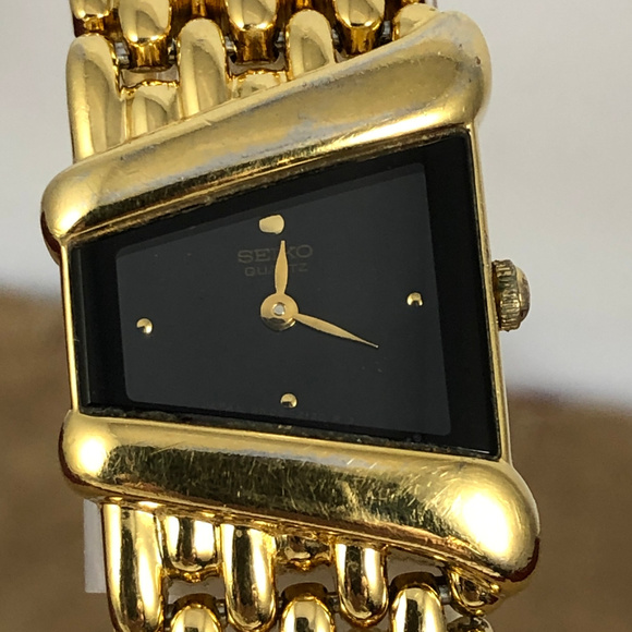 seiko gold black dial